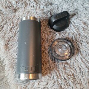 Black/grey screw top 18oz Yeti water bottle - has some damage in pictures